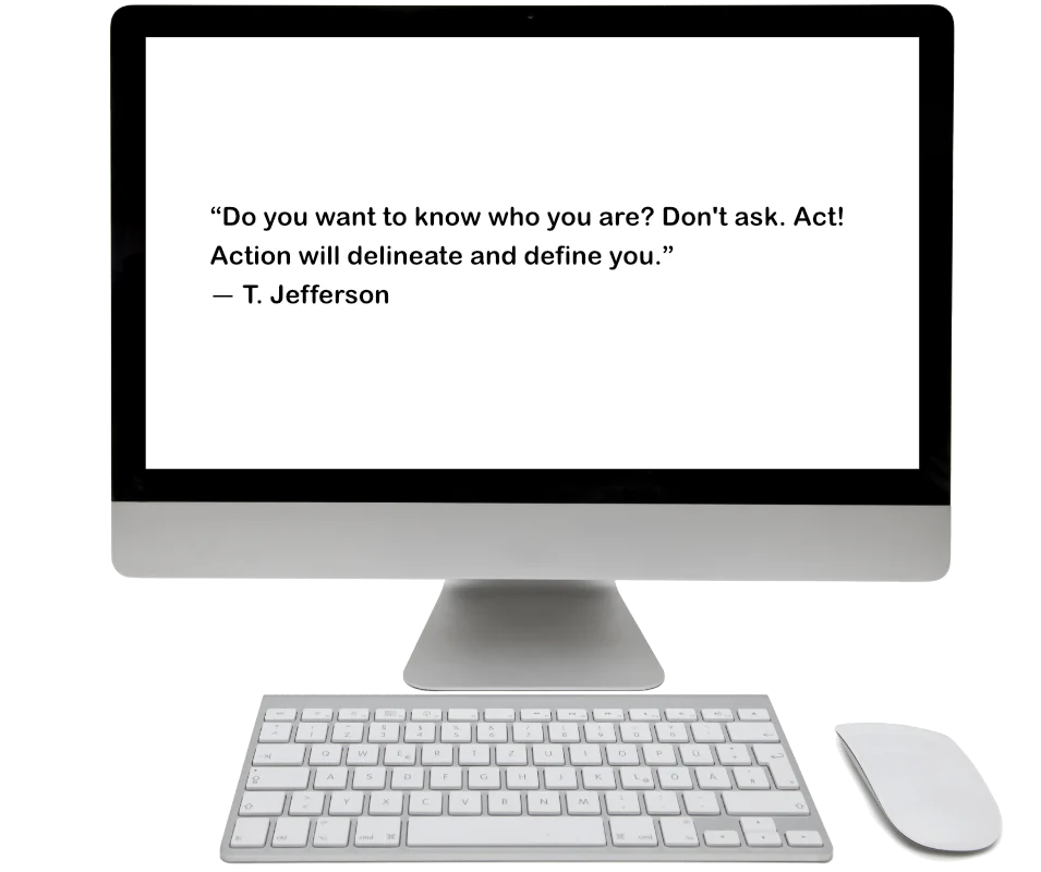 Computer workstation displaying a quote about taking action